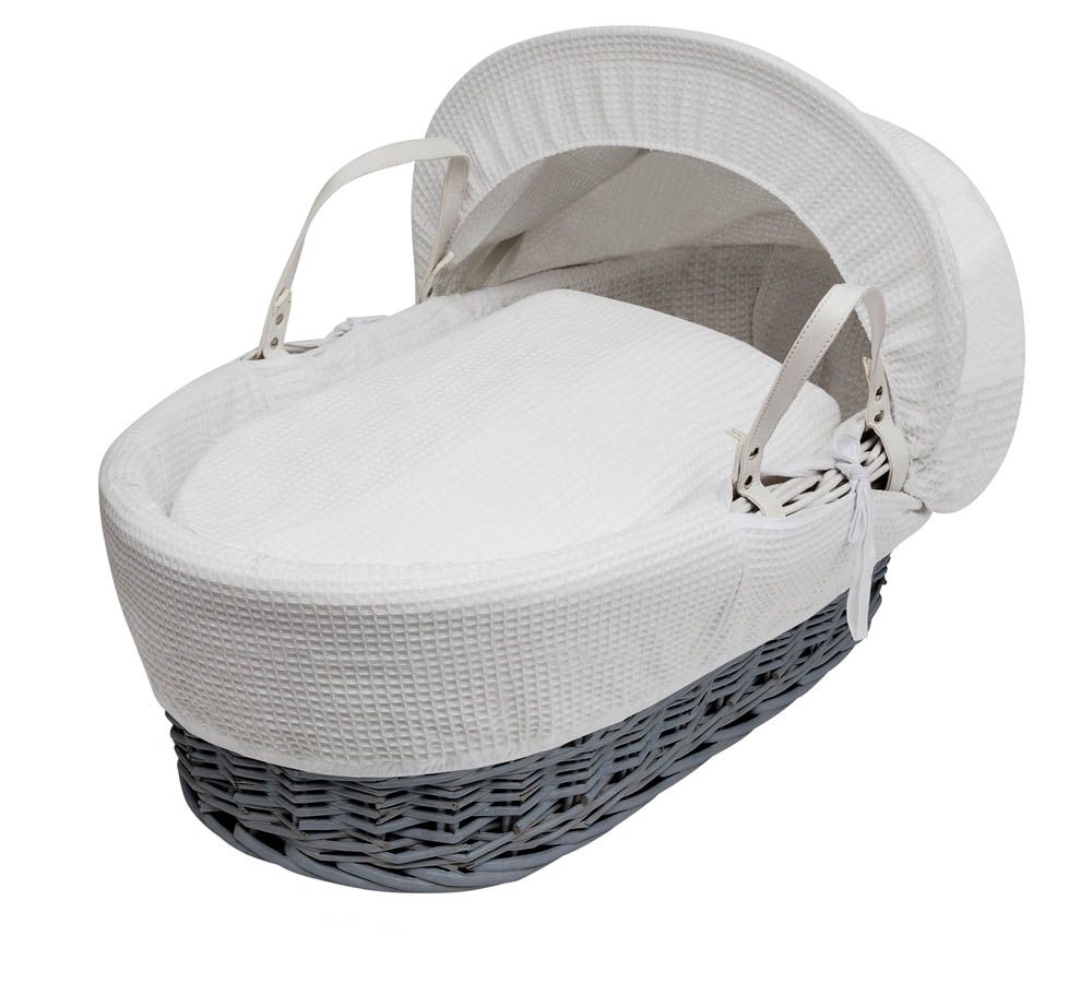 Grey and white moses basket deals with stand