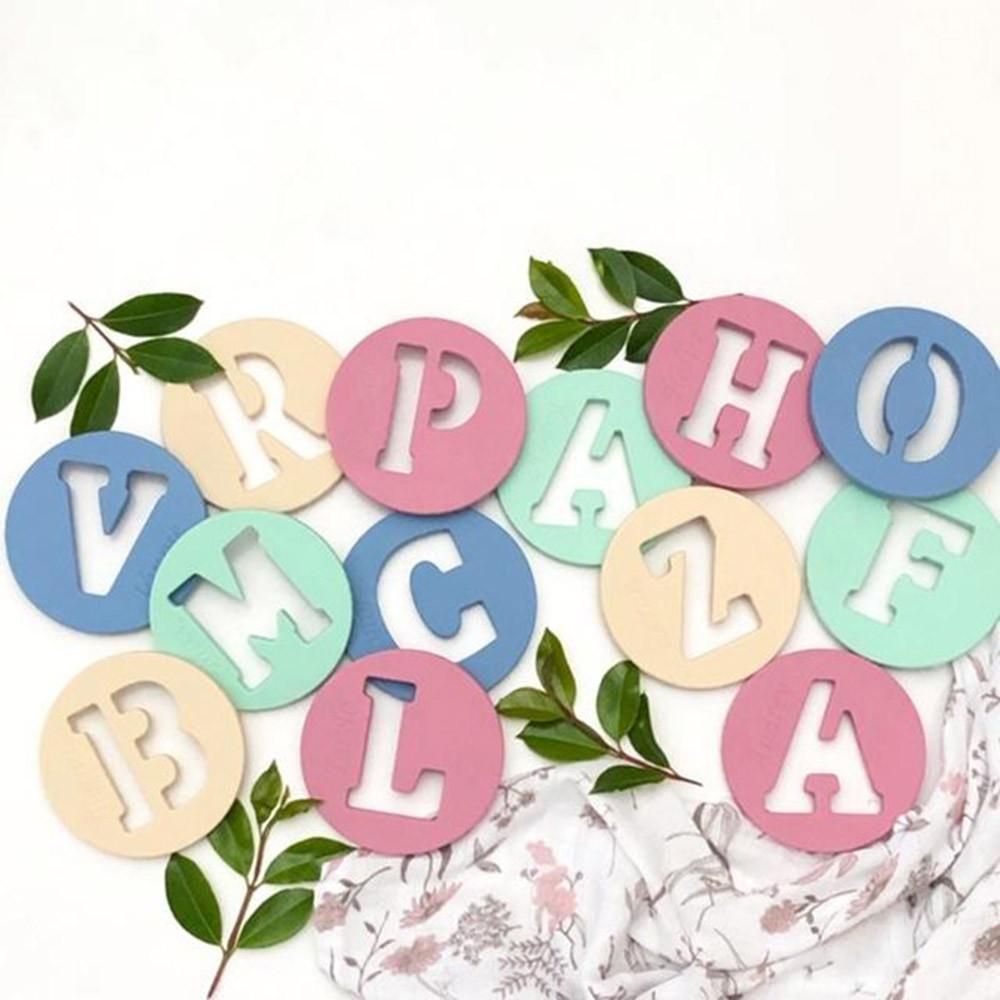 One.Chew.Three Alphabet Chews Silicone Letter Teething Disc D - Pink