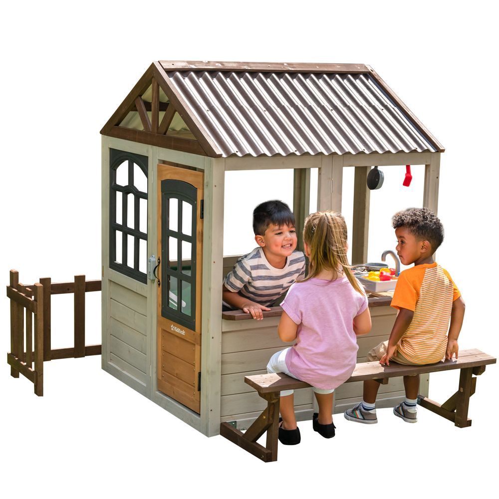 KidKraft Pioneer Cottage Wooden Playhouse - Outdoor Toy for Kids, Playhouse with Porch
