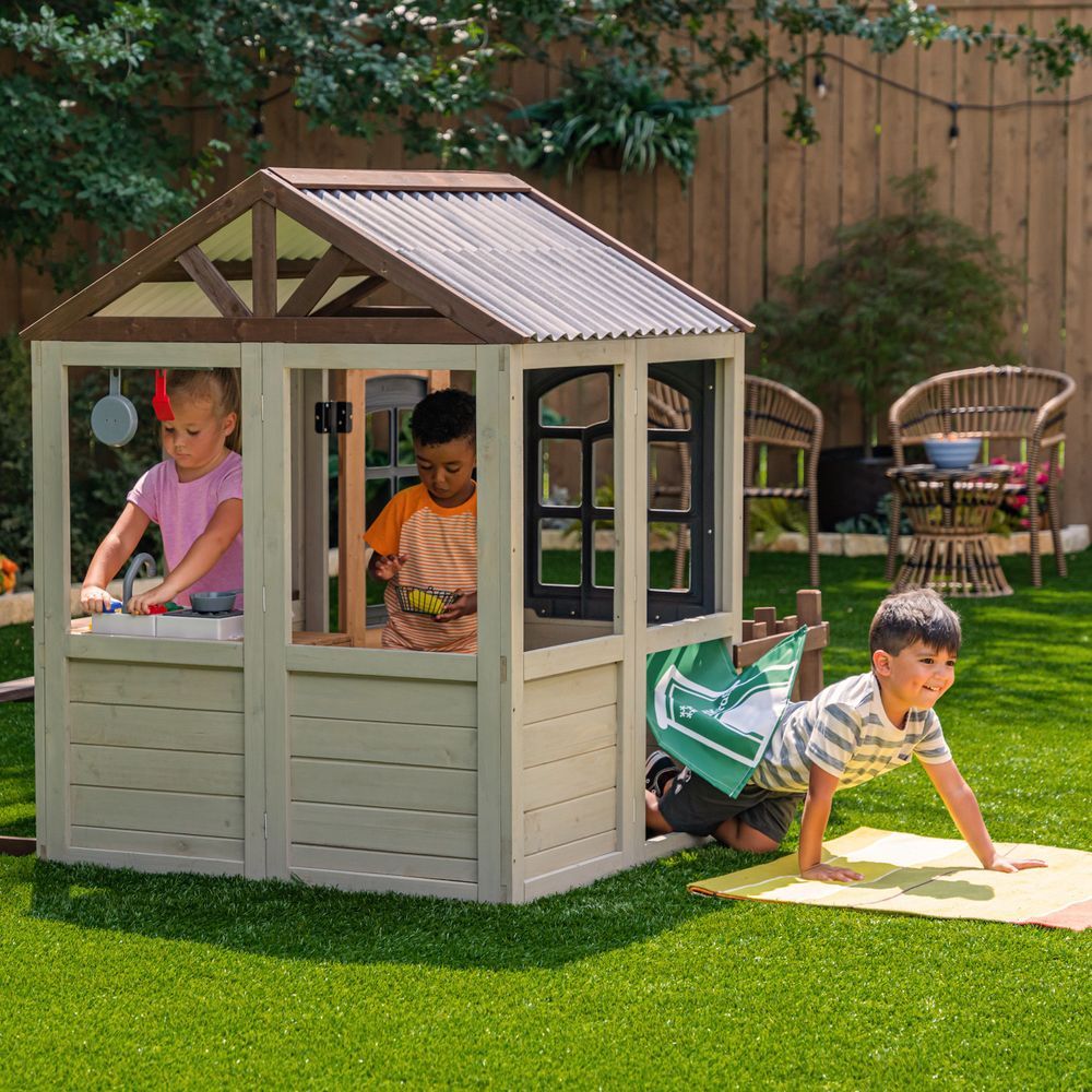 KidKraft Pioneer Cottage Wooden Playhouse - Outdoor Toy for Kids, Playhouse with Porch
