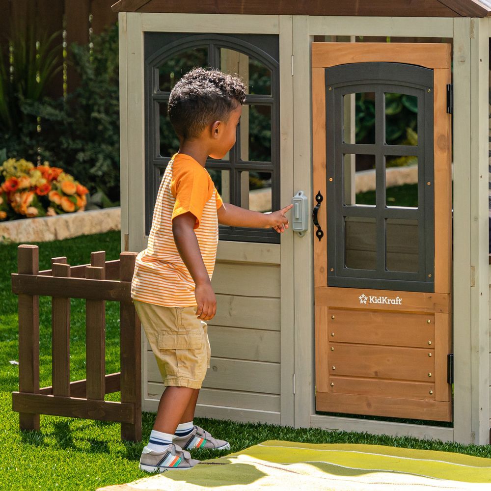 KidKraft Pioneer Cottage Wooden Playhouse - Outdoor Toy for Kids, Playhouse with Porch